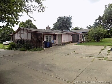 Concrete driveway and large parking area