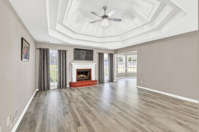 Unfurnished living room featuring ornamental moldi