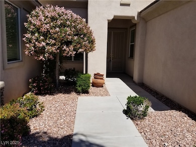Doorway to property with stucco siding