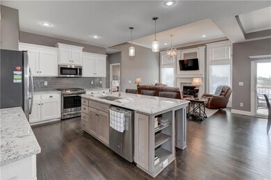 Amazing open kitchen with upgraded granite, soft c