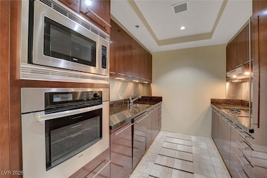 Kitchen featuring stainless steel appliances, mode