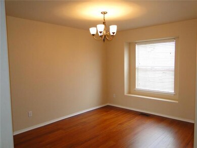 Dining Room. Formal dining room with box window.