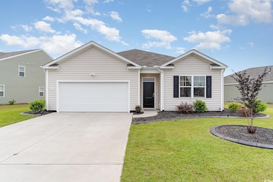 Single story home with roof with shingles, a front