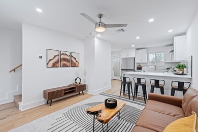 Living room featuring light wood-style floors, vi