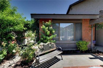 Lush Front Yard and gated fenced front Courtyard