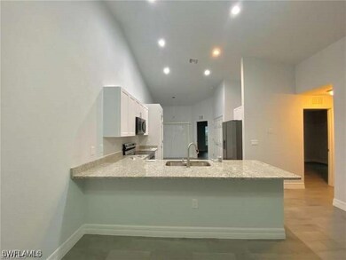 Kitchen featuring a sink, appliances with stainles