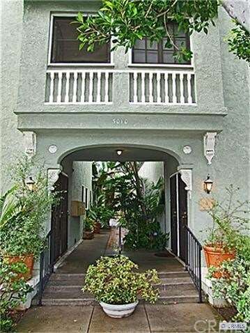 Arched breezeway into the 14 apartments