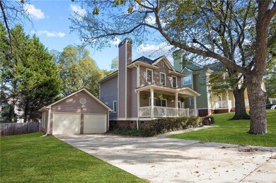 View of front of house with driveway, crawl space,