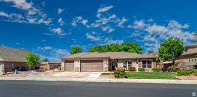 Ranch-style home with a tile roof, stone siding, fence, an attached garage, and stucco siding
