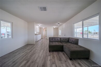 Living room with a wealth of natural light and woo
