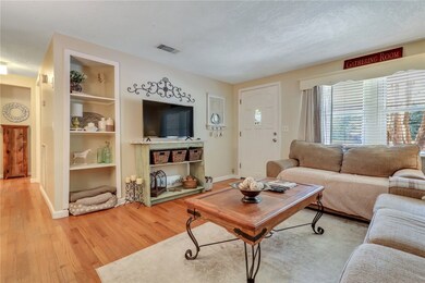 Living area looking to front door.