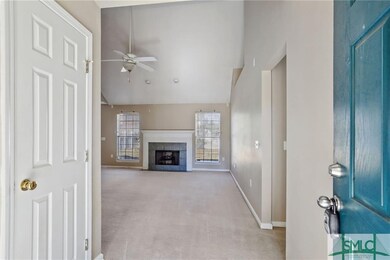 Enter into the tiled foyer with coat closet. Notic