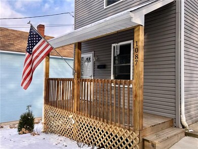 Inviting front porch with new landscaping complete
