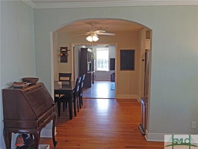 View through the curved archway to the back of the