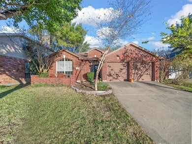 Beautiful large front yard with mature trees.