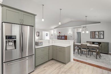 Open concept first floor with cathedral ceilings!