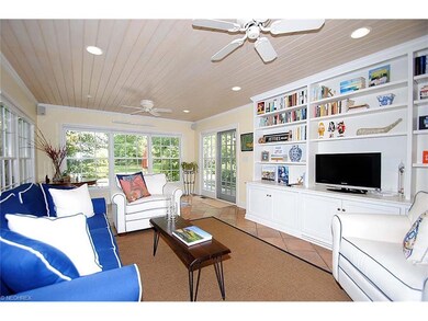Terrific family room with paneled ceiling and buil