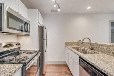 Kitchen featuring appliances with stainless steel 