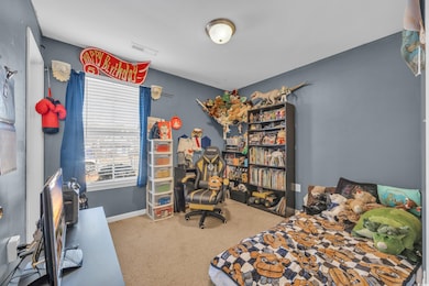 Bedroom with carpet flooring