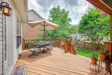 More deck space with large stairway to gorgeous patio