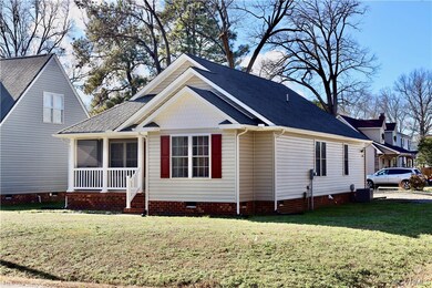 View of front of property with central air conditi