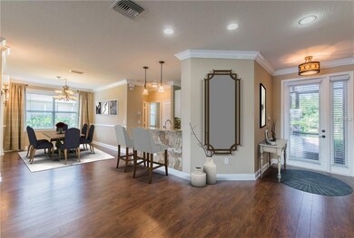 Virtually Staged Front Entry, Formal Dining & Brea