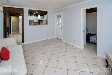 View of living room leading into kitchen