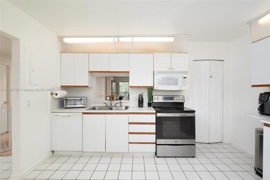 1720 Hammock Blvd unit 209, Coconut Creek, FL 33063 - photo 3