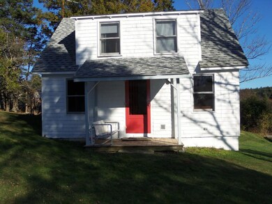 Sunny Main House siting on a knoll...