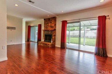 Master Bedroom with its own brick-lined fireplace,
