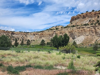 Property view of mountains with a rural view
