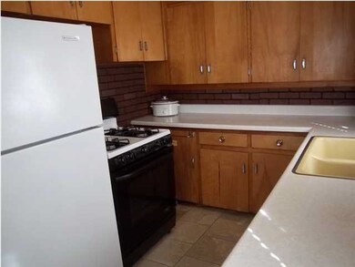 The Kenmore gas stove and dishwasher, KitchenAid r
