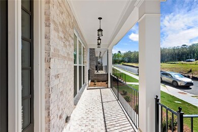 Enjoy your covered balcony throughout the seasons!  Photo of previously built Greenville floorplan.