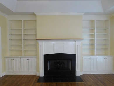A closer look at the custom cabinets and fireplace. 