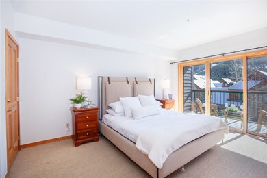 This spacious primary bedroom comes with a private