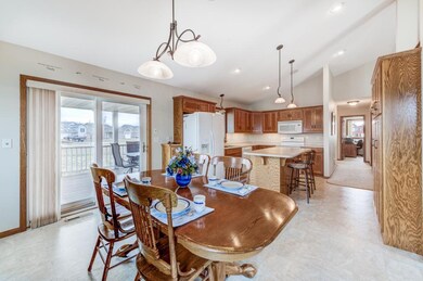 Open dining kitchen area allows for flow for gathe