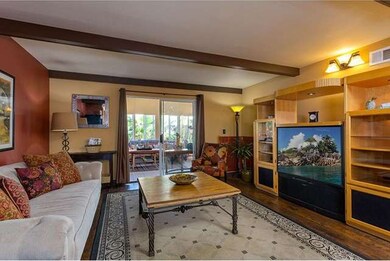 Sunken family room with hardwood floors and ceilin