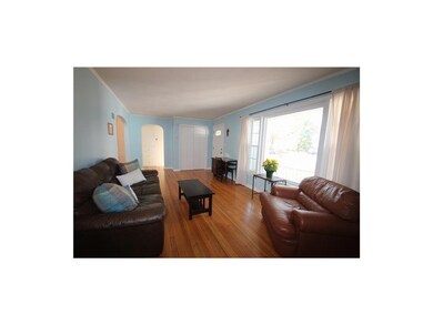 Lovely Picture Window And Great Hardwood Floors
