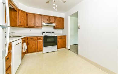 Clean kitchen with plenty of storage.