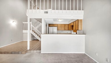 The living area is open to the kitchen.
