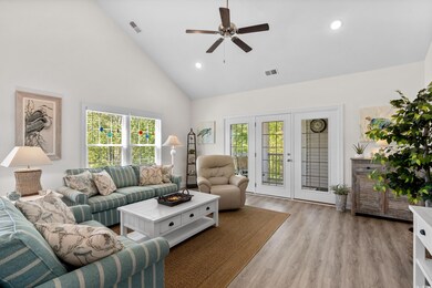 Living room with a healthy amount of sunlight, hig