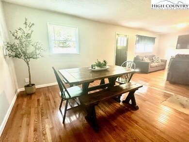 Dining area is open to kitchen and living areas.