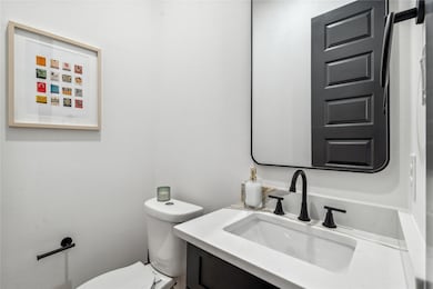 Featuring sleek modern fixtures and a simple, clea