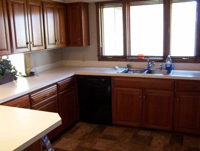 1203 12th St, Grundy Center, IA 50638 - photo 2
