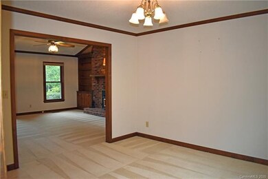 Dining area is open to living room.