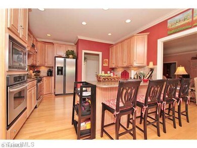Kitchen. Large breakfast bar for entertaining. Over and under cabinet lighting. Top rated appliances.