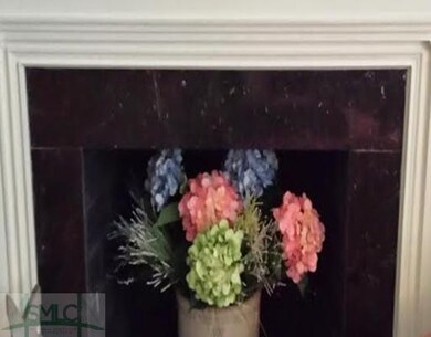 Living Room. Living room Fireplace with black marb