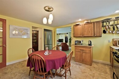 A spacious eat in kitchen with...