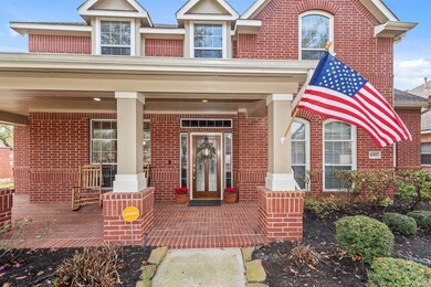 Lead glass front door with glass transoms for more natural light