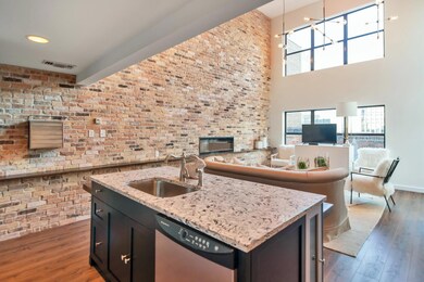 Quartz Kitchen Island with Bar Seating and Below Bar Cabinet Storage...